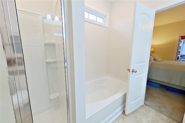 288 Bridgewater Ln, Darien, GA 31305 - bathroom with connected bathroom, a bath, and a stall shower