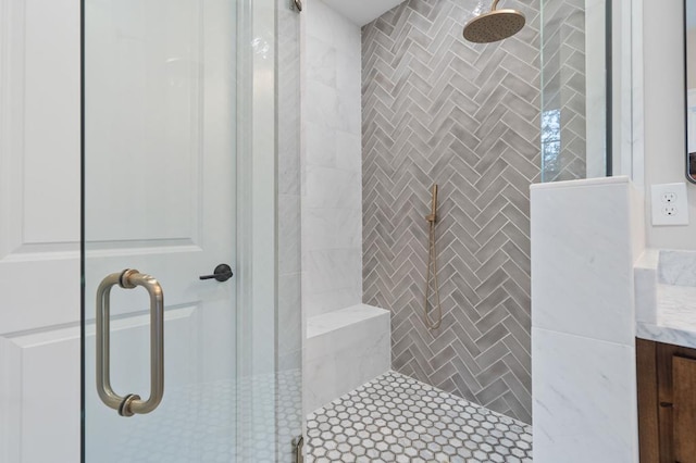 bathroom featuring vanity and walk in shower