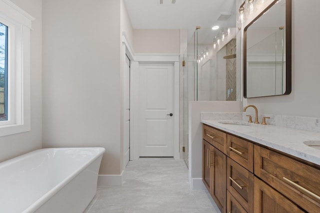 bathroom featuring vanity and separate shower and tub