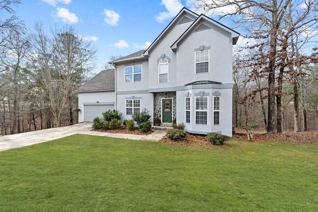 view of front property with a garage and a front lawn