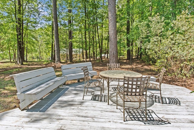 108 Ashwood Pt, Eatonton, GA 31024 - wooden deck with outdoor dining area