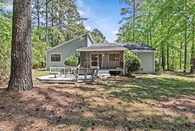 108 Ashwood Pt, Eatonton, GA 31024 - rear view of property with a sunroom, a deck, and roof with shingles