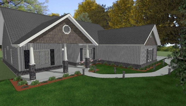 view of front facade with a patio area, a shingled roof, and a front lawn