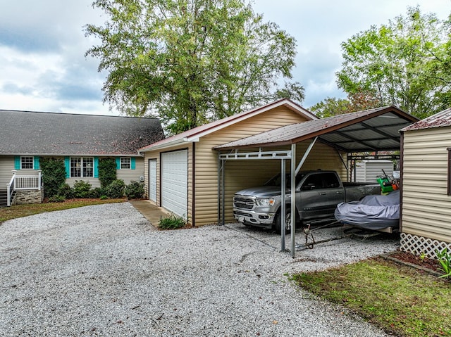 view of parking with a carport and a garage