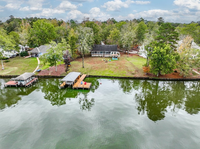 birds eye view of property featuring a water view