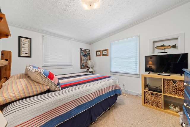 bedroom featuring lofted ceiling, ornamental molding, carpet floors, and a textured ceiling