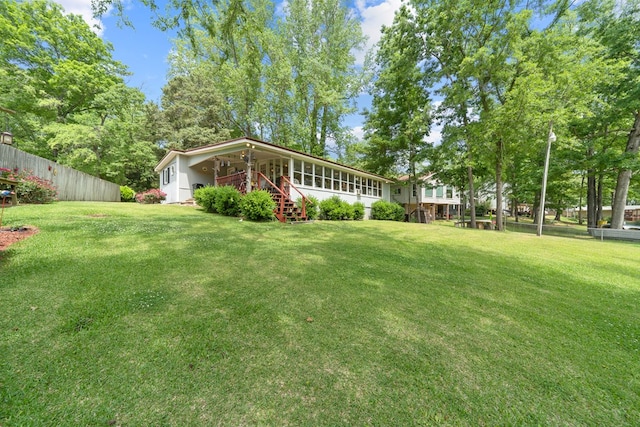 view of yard featuring stairway