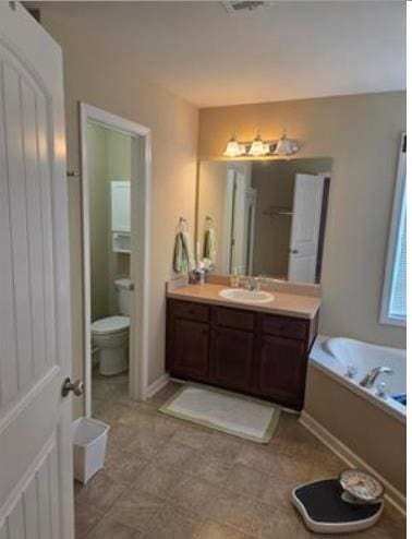 179 Garrett Dr, Eatonton, GA 31024 - bathroom with vanity and a bath