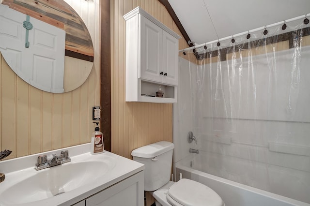 full bathroom featuring vanity, toilet, and shower / tub combo with curtain