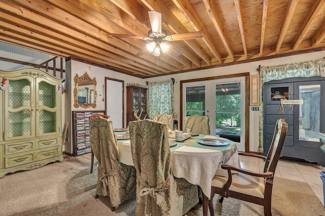 dining room featuring light tile patterned floors, a ceiling fan, and french doors