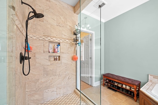 full bathroom with ornamental molding, a stall shower, a garden tub, and tile patterned floors