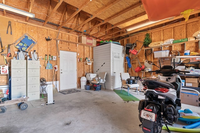 garage featuring a workshop area