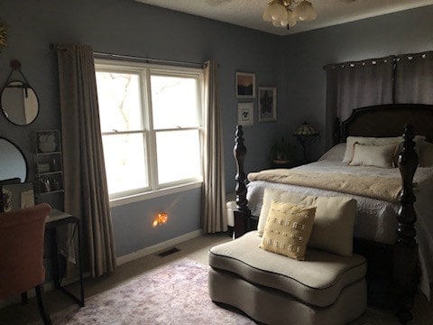 102 Treanor Dr, Milledgeville, GA 31061 - carpeted bedroom with baseboards and visible vents