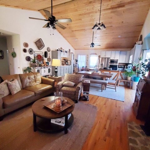 102 Treanor Dr, Milledgeville, GA 31061 - living area with high vaulted ceiling, wood finished floors, ceiling fan, and wood ceiling