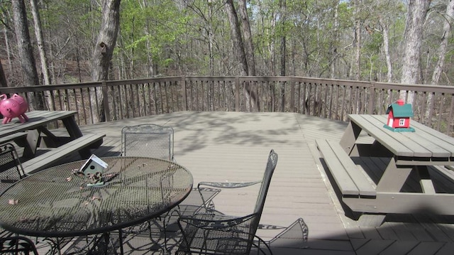 102 Treanor Dr, Milledgeville, GA 31061 - wooden deck with outdoor dining area
