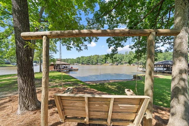128A Montego Bay Rd, Milledgeville, GA 31061 - exterior space featuring a water view, a lawn, and a boat dock