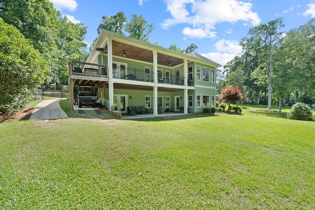 128A Montego Bay Rd, Milledgeville, GA 31061 - rear view of property featuring french doors, a lawn, a patio, and a deck