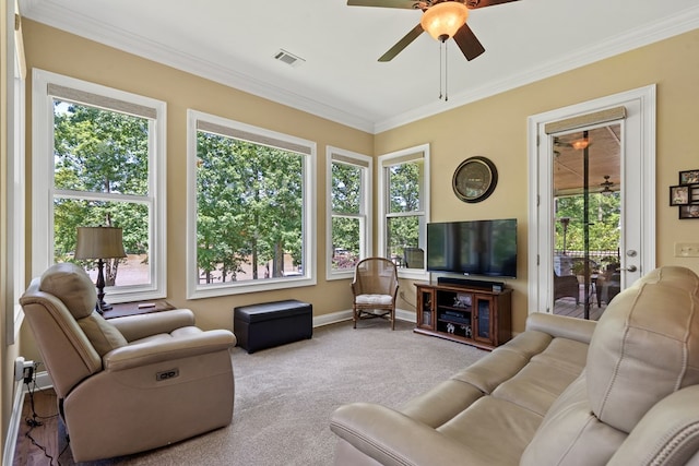 128A Montego Bay Rd, Milledgeville, GA 31061 - carpeted living area featuring a ceiling fan, crown molding, and baseboards