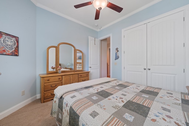 128A Montego Bay Rd, Milledgeville, GA 31061 - bedroom with light carpet, ornamental molding, a closet, baseboards, and a ceiling fan