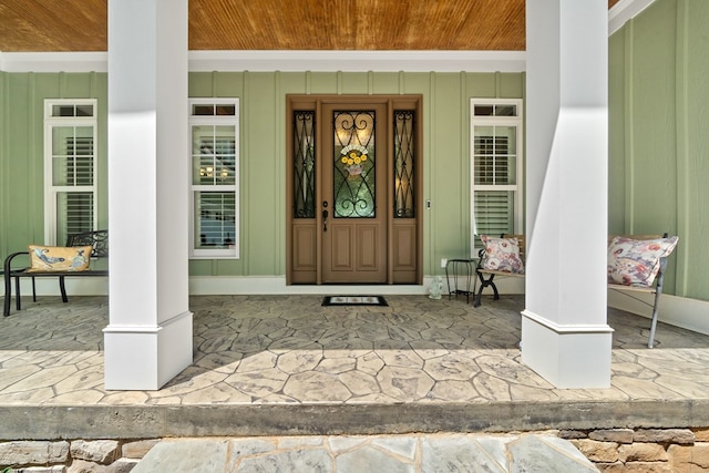 128A Montego Bay Rd, Milledgeville, GA 31061 - doorway to property with a porch and board and batten siding