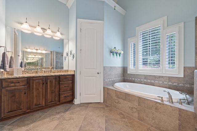 128A Montego Bay Rd, Milledgeville, GA 31061 - full bath featuring vanity, a bath, and a stall shower