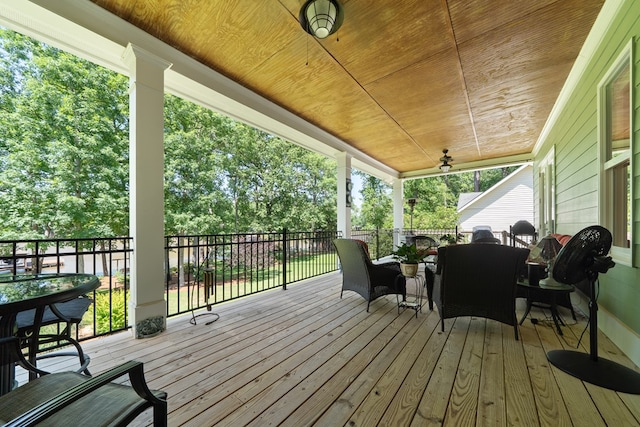 128A Montego Bay Rd, Milledgeville, GA 31061 - wooden terrace with outdoor dining space and a ceiling fan