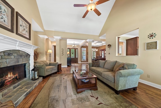 128A Montego Bay Rd, Milledgeville, GA 31061 - living room with wood finished floors, decorative columns, baseboards, a chandelier, and high vaulted ceiling