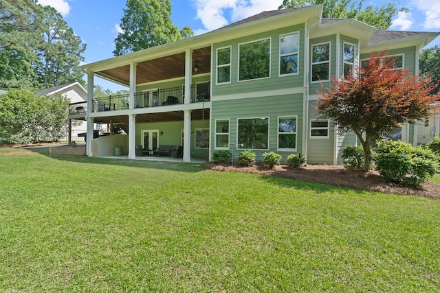 128A Montego Bay Rd, Milledgeville, GA 31061 - rear view of house featuring a yard, french doors, and a patio area