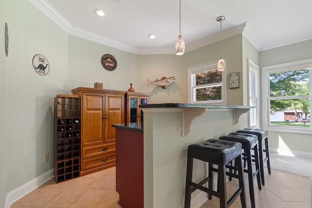 128A Montego Bay Rd, Milledgeville, GA 31061 - indoor dry bar featuring light tile patterned floors, ornamental molding, baseboards, pendant lighting, and recessed lighting