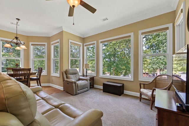 128A Montego Bay Rd, Milledgeville, GA 31061 - living room featuring a ceiling fan, baseboards, a chandelier, and ornamental molding