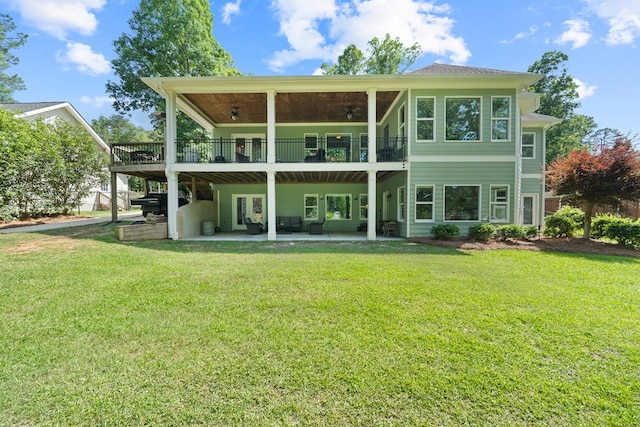 128A Montego Bay Rd, Milledgeville, GA 31061 - rear view of house featuring ceiling fan, a lawn, a patio area, and a deck