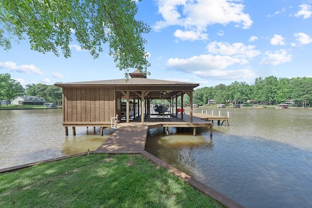 128A Montego Bay Rd, Milledgeville, GA 31061 - dock area featuring a water view and boat lift