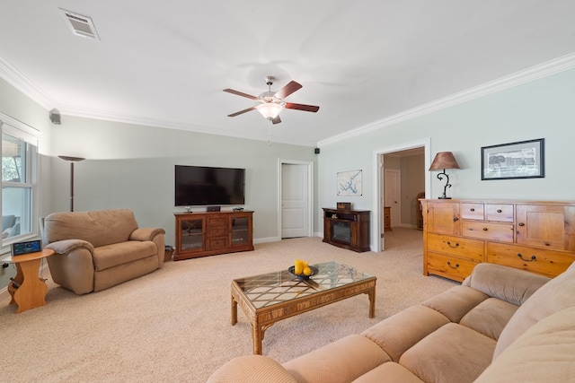 128A Montego Bay Rd, Milledgeville, GA 31061 - living area with ornamental molding, light carpet, ceiling fan, and baseboards
