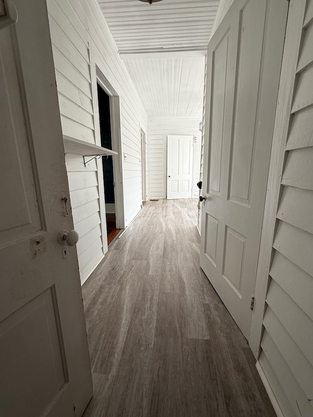 120 Franklin St, Milledgeville, GA 31061 - hallway featuring dark wood-style flooring and wood walls