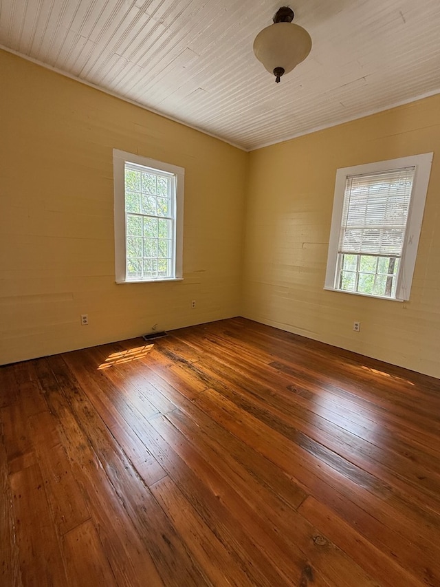120 Franklin St, Milledgeville, GA 31061 - unfurnished room with hardwood / wood-style floors, healthy amount of natural light, and wood ceiling