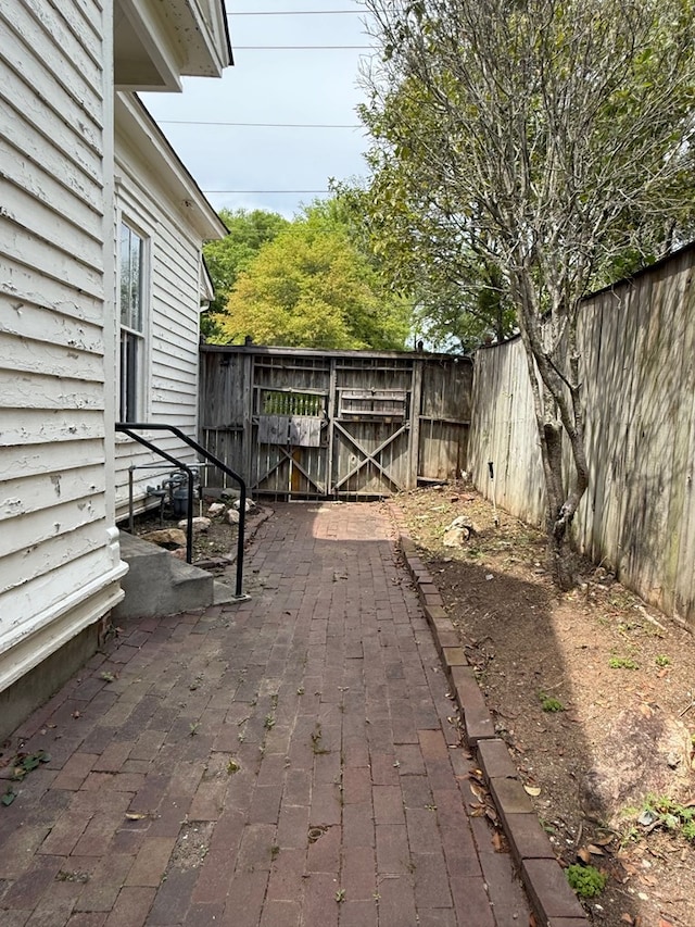 120 Franklin St, Milledgeville, GA 31061 - view of patio featuring a fenced backyard and a gate
