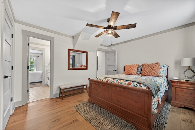 517 Hill Valley Rd, Sparta, GA 31087 - bedroom featuring light wood-style flooring, connected bathroom, baseboards, and a ceiling fan