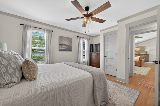 517 Hill Valley Rd, Sparta, GA 31087 - bedroom with light wood finished floors and ceiling fan
