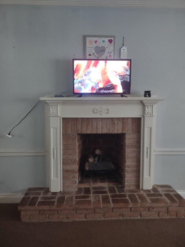 1745 Cedarwood Dr, Milledgeville, GA 31061 - detailed view of a brick fireplace and baseboards