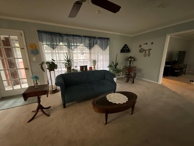 1745 Cedarwood Dr, Milledgeville, GA 31061 - living room with carpet, a ceiling fan, crown molding, and baseboards