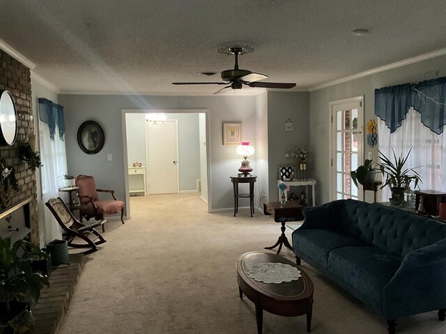 1745 Cedarwood Dr, Milledgeville, GA 31061 - living room with ornamental molding, light carpet, ceiling fan, a fireplace, and a textured ceiling
