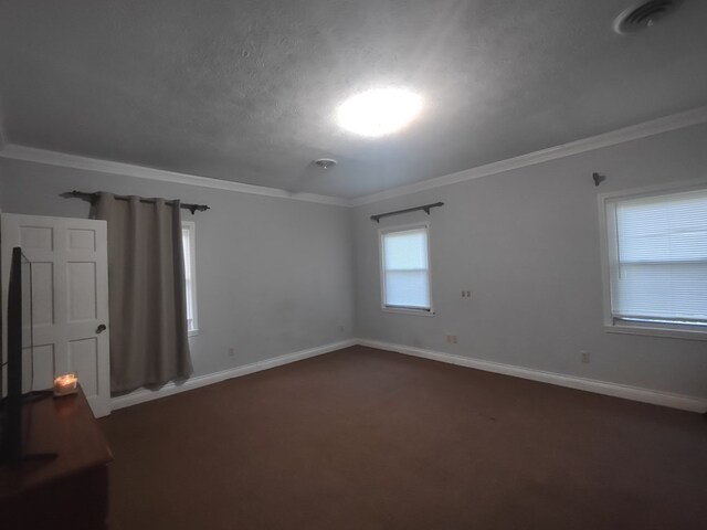 1745 Cedarwood Dr, Milledgeville, GA 31061 - empty room with crown molding, dark colored carpet, and baseboards