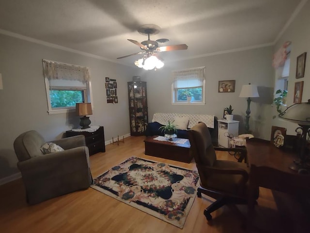 1745 Cedarwood Dr, Milledgeville, GA 31061 - living room with crown molding, wood finished floors, a ceiling fan, and baseboards