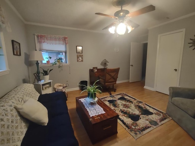 1745 Cedarwood Dr, Milledgeville, GA 31061 - living room featuring ceiling fan, wood finished floors, ornamental molding, and baseboards