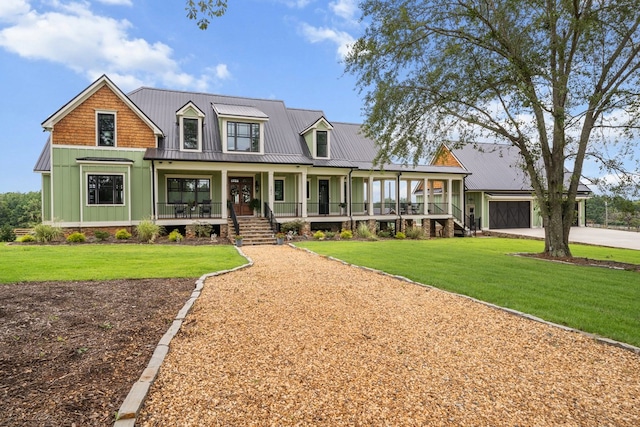 view of front of property with covered porch and a front lawn