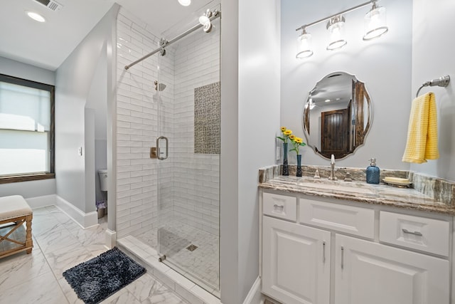 bathroom with vanity and walk in shower