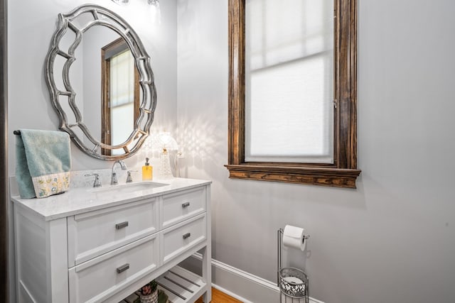 bathroom with vanity and a healthy amount of sunlight