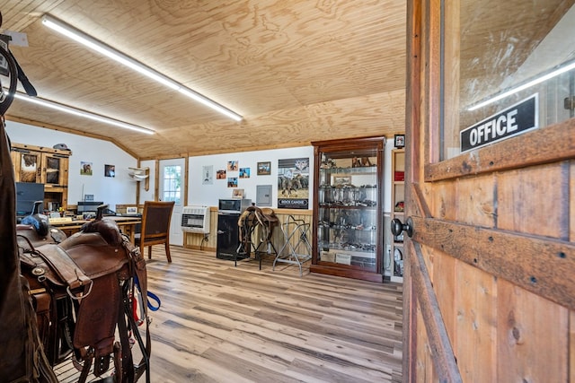 office area featuring hardwood / wood-style floors, heating unit, vaulted ceiling, and wood ceiling