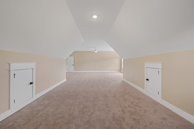 bonus room with carpet and lofted ceiling