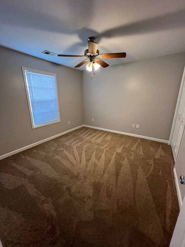 empty room featuring carpet floors